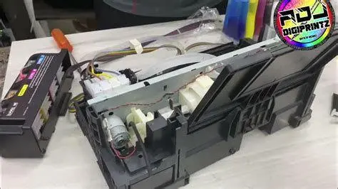Modifikasi Pembuangan Tinta Pemasangan botol pembuangan tinta eksternal pada Epson L360
