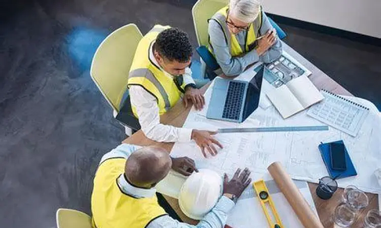 Kolaborasi Tim Konstruksi Rapat tim konstruksi menggunakan data digital